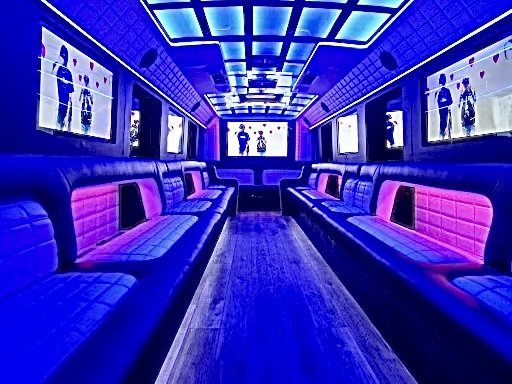 The Royale party bus interior with blue and pink LED lighting